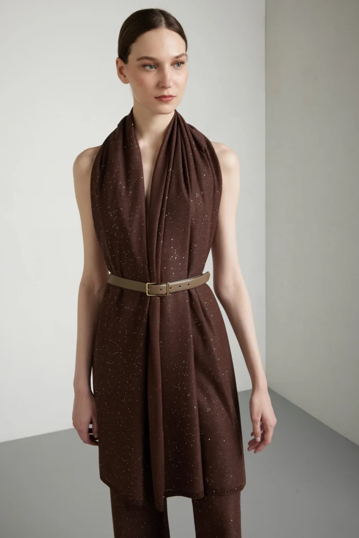 Shrug with micro-sequins.
